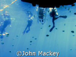 End of dive.....back to boat after diving USS Mahi in Hawaii by John Mackey 